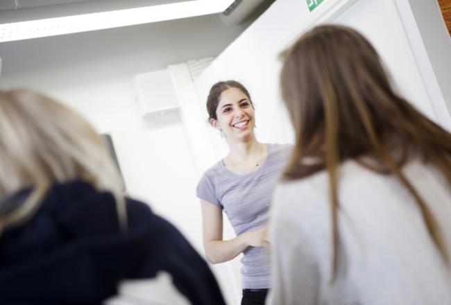 Teacher in front of students