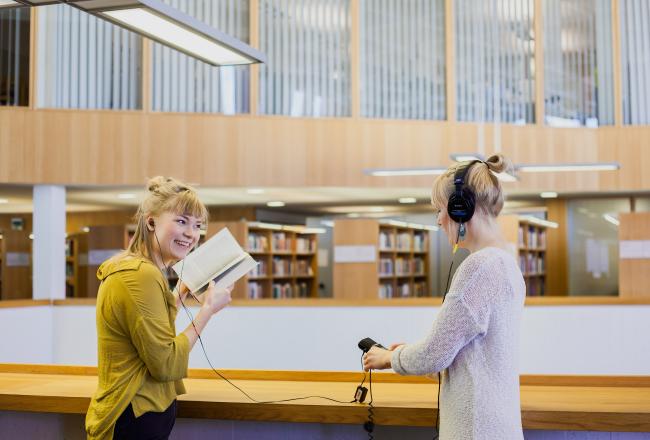 Two women in a library