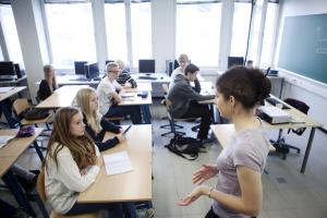 A teacher speaking to a class