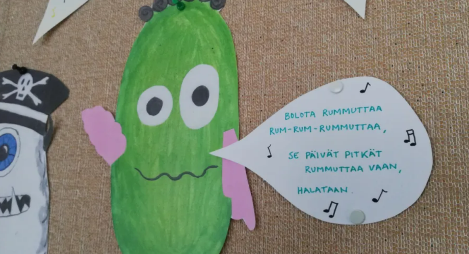 In the picture, there is a drawing of a monster that sings in Finnish.