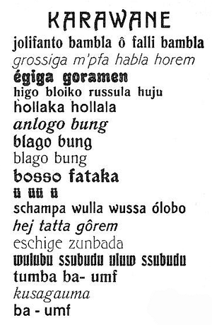 Eri kokoisilla ja näköisillä fonteilla kirjoitettu Karawane-niminen runo, jossa ei lue mitään todellista kieltä. Runo alkaa "jolifanto bambla o falli bambla großiga m'pfa habla horem egiga goramen".