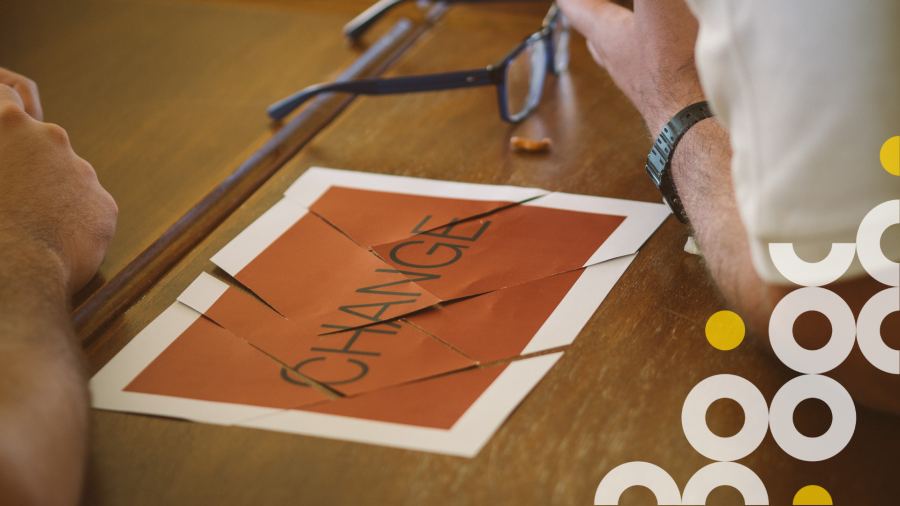 a picture of a reassembled paper on a table with the word "change" on it