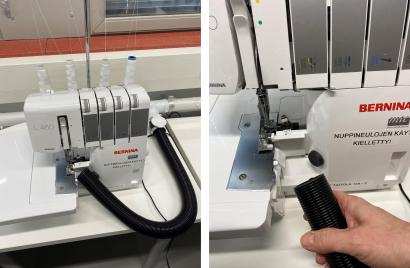 Kuvituskuva: Saumurin pölynpoiston putkisto kiinnitetty magneetilla saumurin kylkeen.
